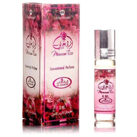Geleide afbeelding van Al-Rehab Parfumolie Moroccan Rose in helder glazen flesje en doos