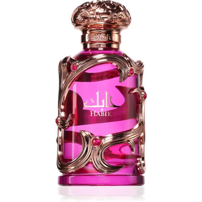 Roze glazen Habik for Woman-parfumfles met gouden en rode accenten