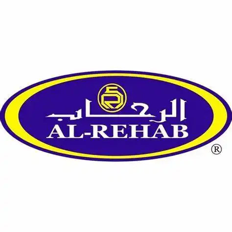 Een ovale blauwe en gele logo met Arabische en Engelse tekst 'AL-REHAB' met een gestileerd 'R' symbool.